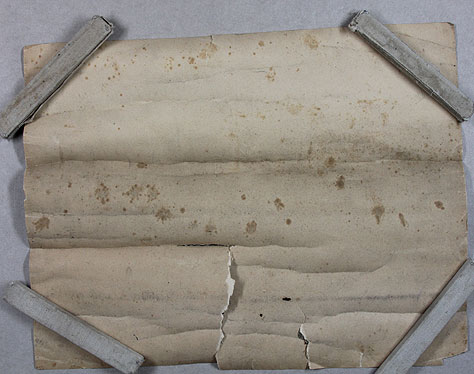 Bild 3: Rückseite des Plans, gut erkennbar ist wie schlecht sich der Plan aufrollen lässt.